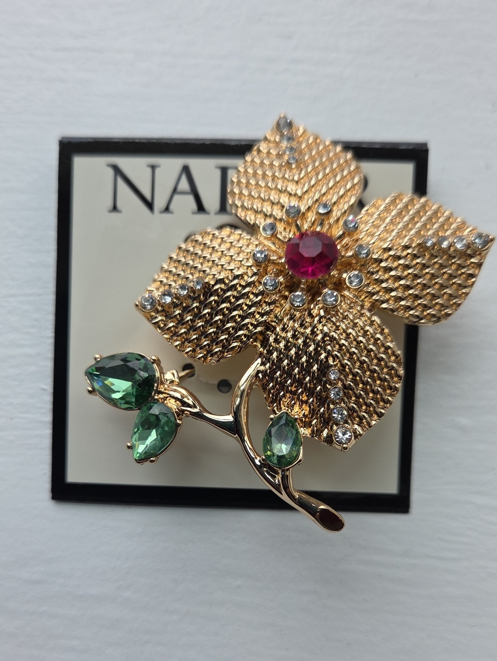 Napier Gold Floral Brooch with Red Center and Emerald Accents